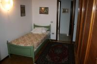 A bed or beds in a room at Riviera 34