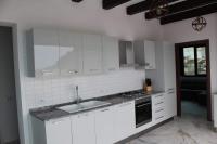 A kitchen or kitchenette at Palazzo del Golfo Penthouse