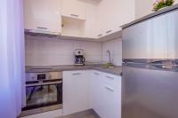 Kuchyňa alebo kuchynka v ubytovaní Apartmani Beatrice