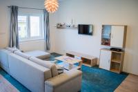 TV a/nebo společenská místnost v ubytování Apartmán Laura, Frymburk