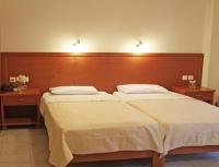 A bed or beds in a room at Neon Studios