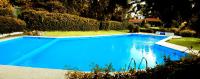 Bazén v ubytovaní Sani Pool Beach Villa alebo v jeho blízkosti