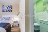 A bed or beds in a room at AYZ Villegas - Auto check-in property
