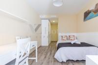 A bed or beds in a room at AYZ Villegas - Auto check-in property
