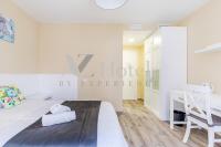 A bed or beds in a room at AYZ Villegas - Auto check-in property
