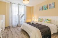 A bed or beds in a room at AYZ Villegas - Auto check-in property