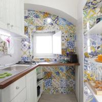 A kitchen or kitchenette at La Casetta di Meta