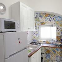 A kitchen or kitchenette at La Casetta di Meta