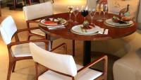 a table with plates of food and glasses of wine at Jatiuca Hotel & Resort in Maceió
