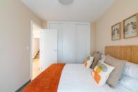 A bed or beds in a room at UNIQUE HOMES LAS SETAS LA CAMPANA