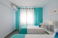 A bed or beds in a room at UNIQUE HOMES LAS SETAS LA CAMPANA
