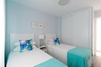 A bed or beds in a room at UNIQUE HOMES LAS SETAS LA CAMPANA
