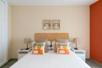 A bed or beds in a room at UNIQUE HOMES LAS SETAS LA CAMPANA