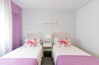 A bed or beds in a room at UNIQUE HOMES LAS SETAS LA CAMPANA