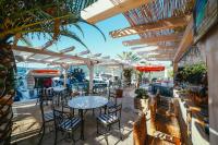 Reštaurácia alebo iné gastronomické zariadenie v ubytovaní Villa Rava Hotel & restaurant