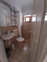 Kúpeľňa v ubytovaní Família Apartmanház
