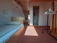 Posteľ alebo postele v izbe v ubytovaní Família Apartmanház