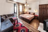 Postel nebo postele na pokoji v ubytování Keremidchieva Kushta Guest House