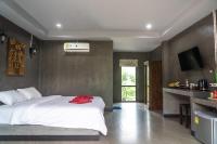 Ein Bett oder Betten in einem Zimmer der Unterkunft Chomview Resort