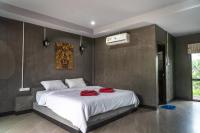 Ein Bett oder Betten in einem Zimmer der Unterkunft Chomview Resort