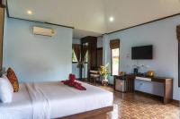 Ein Bett oder Betten in einem Zimmer der Unterkunft Chomview Resort