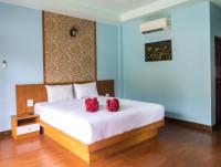 Ein Bett oder Betten in einem Zimmer der Unterkunft Chomview Resort