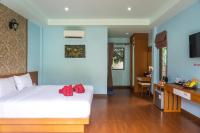 Ein Bett oder Betten in einem Zimmer der Unterkunft Chomview Resort