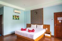 Ein Bett oder Betten in einem Zimmer der Unterkunft Chomview Resort