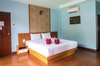 Ein Bett oder Betten in einem Zimmer der Unterkunft Chomview Resort