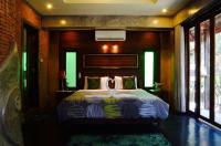 Postel nebo postele na pokoji v ubytování Soi One Boutique Bedrooms