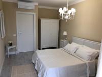 Posteľ alebo postele v izbe v ubytovaní B&B Da Patty