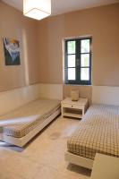 Postel nebo postele na pokoji v ubytování Kalydna Island Hotel