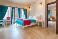 Postel nebo postele na pokoji v ubytování Hillcity Hotel