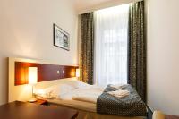 Postel nebo postele na pokoji v ubytování Hotel Atos