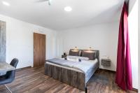 Posteľ alebo postele v izbe v ubytovaní Apinelo Port Rooms