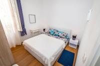Posteľ alebo postele v izbe v ubytovaní History Apartments Center