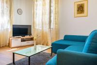 Televízia a/alebo spoločenská miestnosť v ubytovaní History Apartments Center