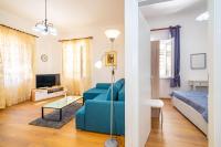 Televízia a/alebo spoločenská miestnosť v ubytovaní History Apartments Center