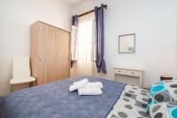 Posteľ alebo postele v izbe v ubytovaní History Apartments Center