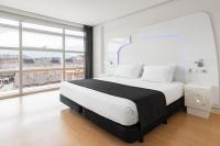 Cama o camas de una habitación en Eurostars Palacio de Cristal