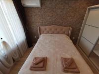 Postel nebo postele na pokoji v ubytování City Center Lux Apartment