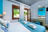 Posteľ alebo postele v izbe v ubytovaní Studios Panagiotas House Astris