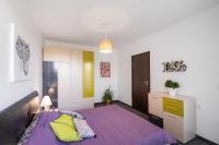 Postel nebo postele na pokoji v ubytování NC Apartment Ruse