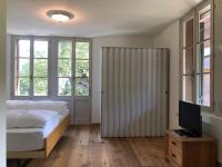 Postel nebo postele na pokoji v ubytování Hotel Krone Budget