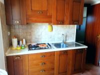 A kitchen or kitchenette at Dammuso Surya Cloe