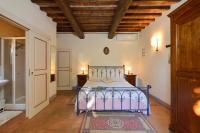 A bed or beds in a room at Agriturismo Malagronda