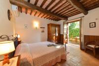A bed or beds in a room at Agriturismo Malagronda