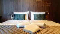 Postel nebo postele na pokoji v ubytování Hotel D1