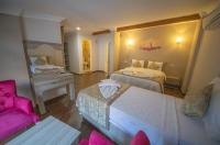 Postel nebo postele na pokoji v ubytování Ağva Carpediem Otel