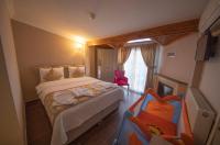 Postel nebo postele na pokoji v ubytování Ağva Carpediem Otel
